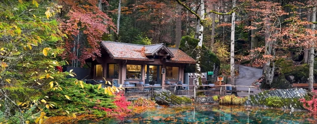 Hut in front of lake blausee